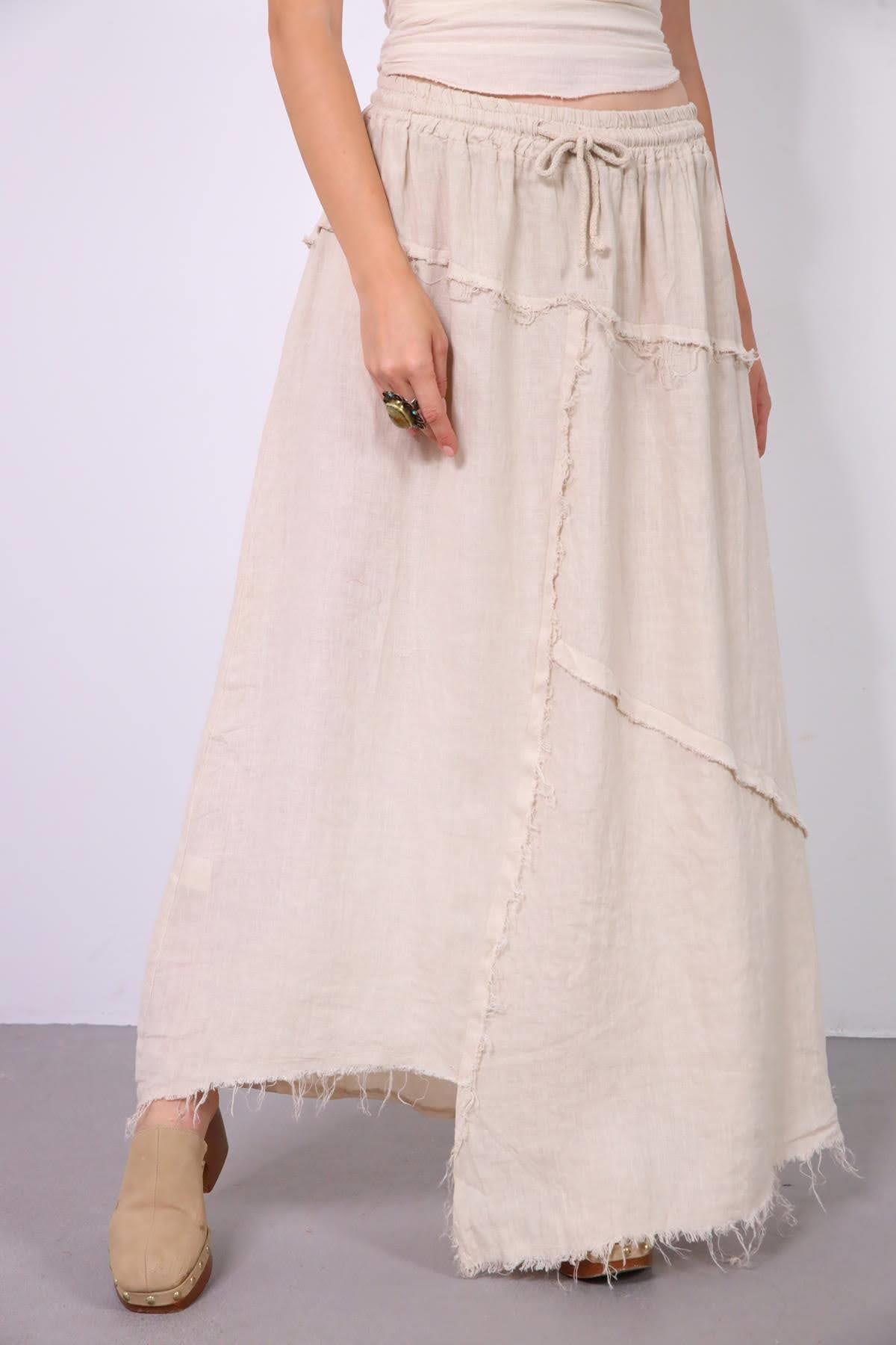  Krem Rengi Asimetrik Püsküllü Dikiş Detaylı Keten Etek
