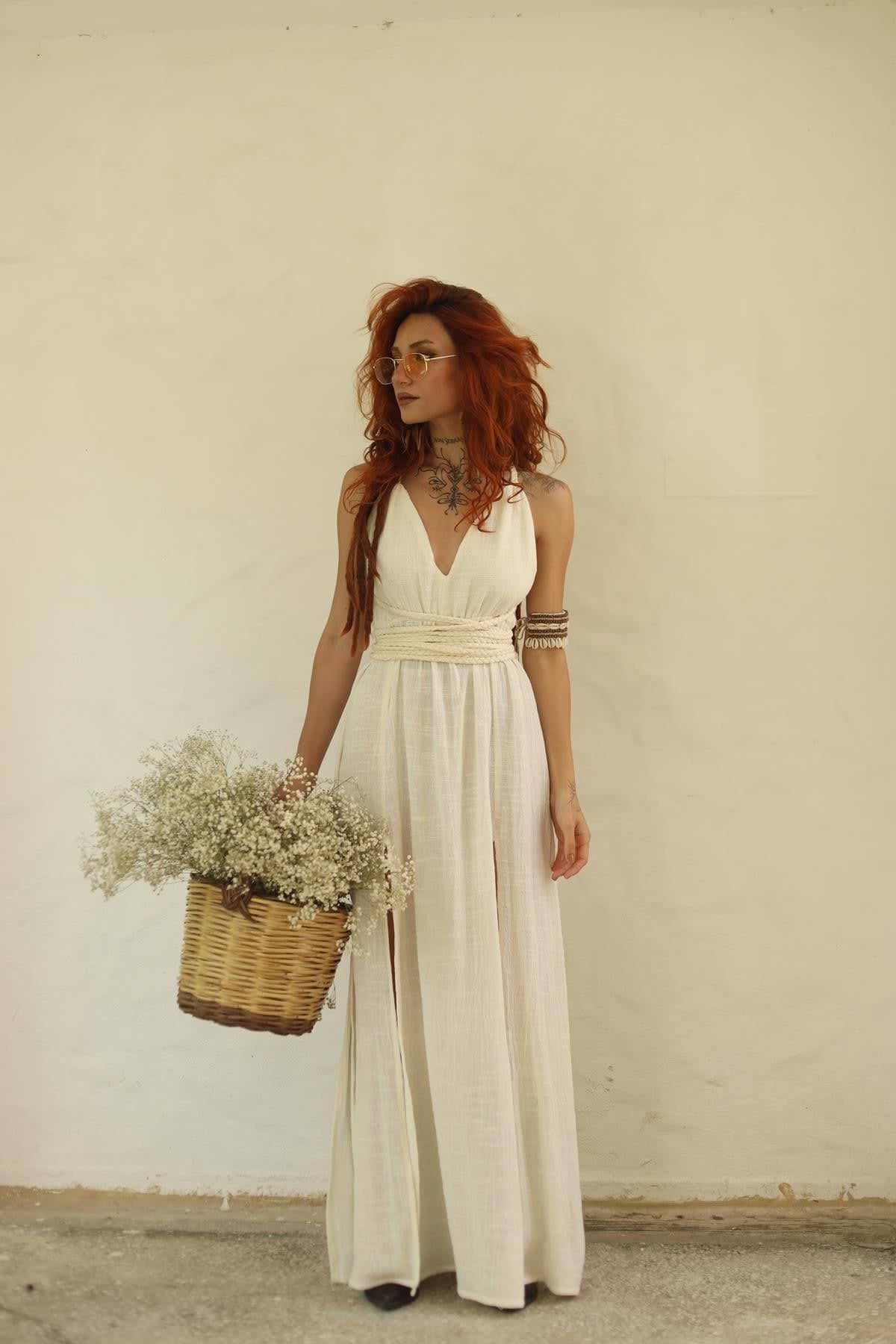 Krem Rengi Yanları Yırtmaçlı Uzun Örgü Askılı Elbise