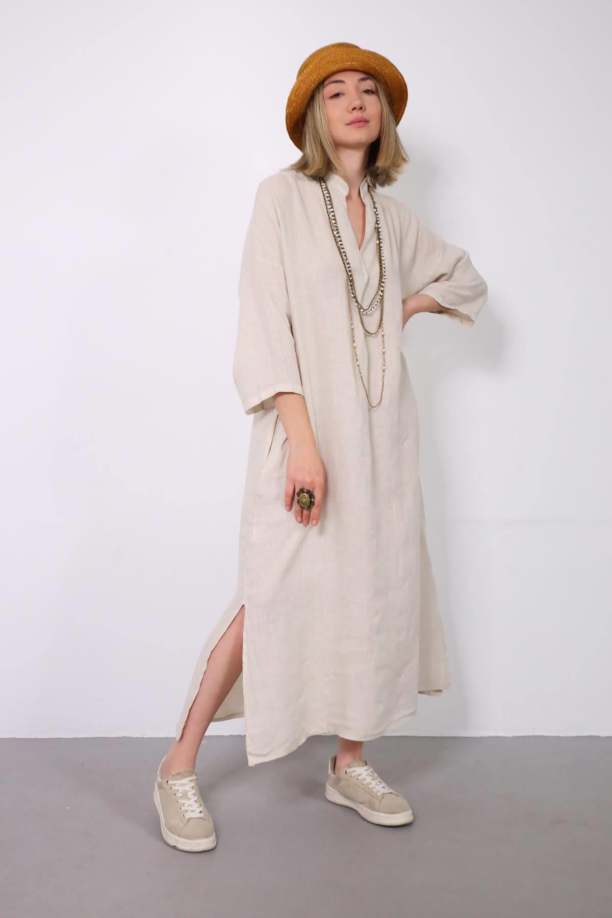 Krem Rengi Hakim Yaka Önü Pileli Uzun Keten Elbise - Şaman Butik Krem Rengi Hakim Yaka Önü Pileli Uzun Keten Elbise