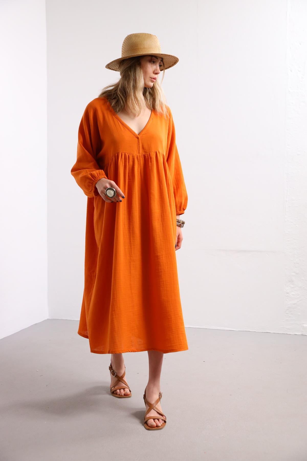  Turuncu Kolları Biyeli Müslin Elbise