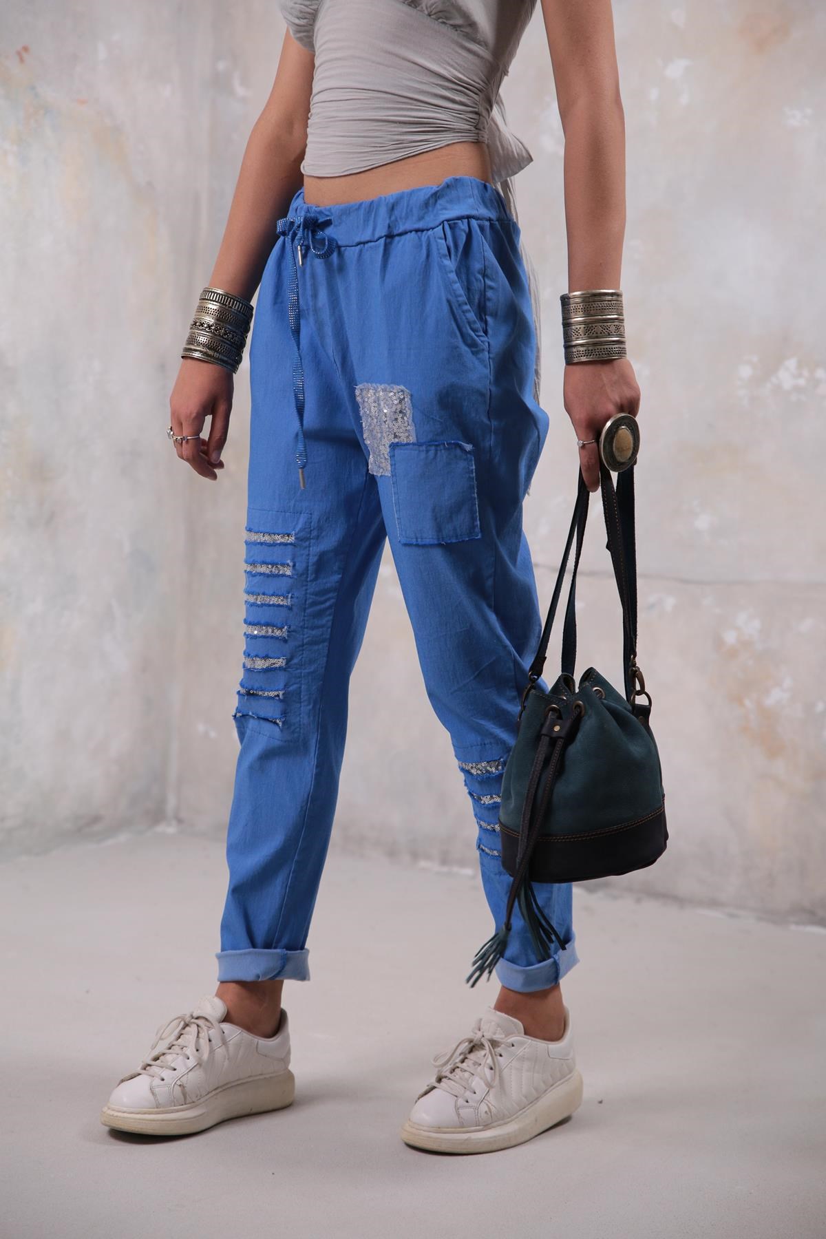  Saks Mavisi Yama Detay Pullu Pantolon