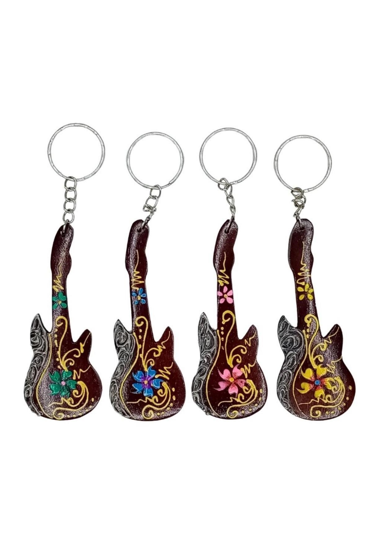 KarayiplerDünyadan HediyelerDNY-HD100541Keskin Hediyelik Eşya Ve TekstilHindistan Cevizi Gitar Anahtarlık Dörtlü Hediyelik Paket
