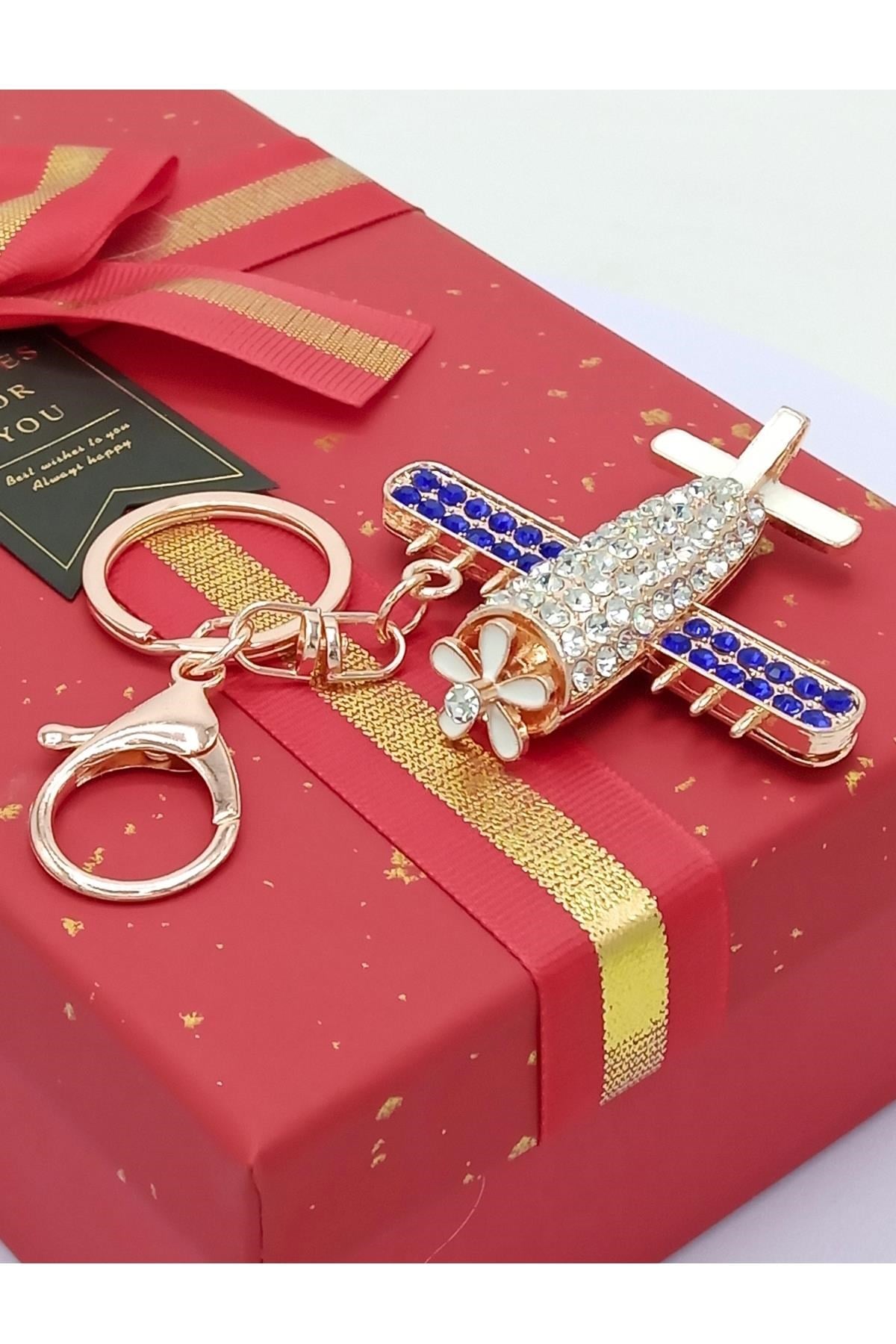 Amerika Birleşik DevletleriDünyadan HediyelerDNY-DHKTANHUCK03Keskin Hediyelik Eşya Ve TekstilKristal Taşlı Lacivert Kanatlı Uçak Anahtarlık No.3