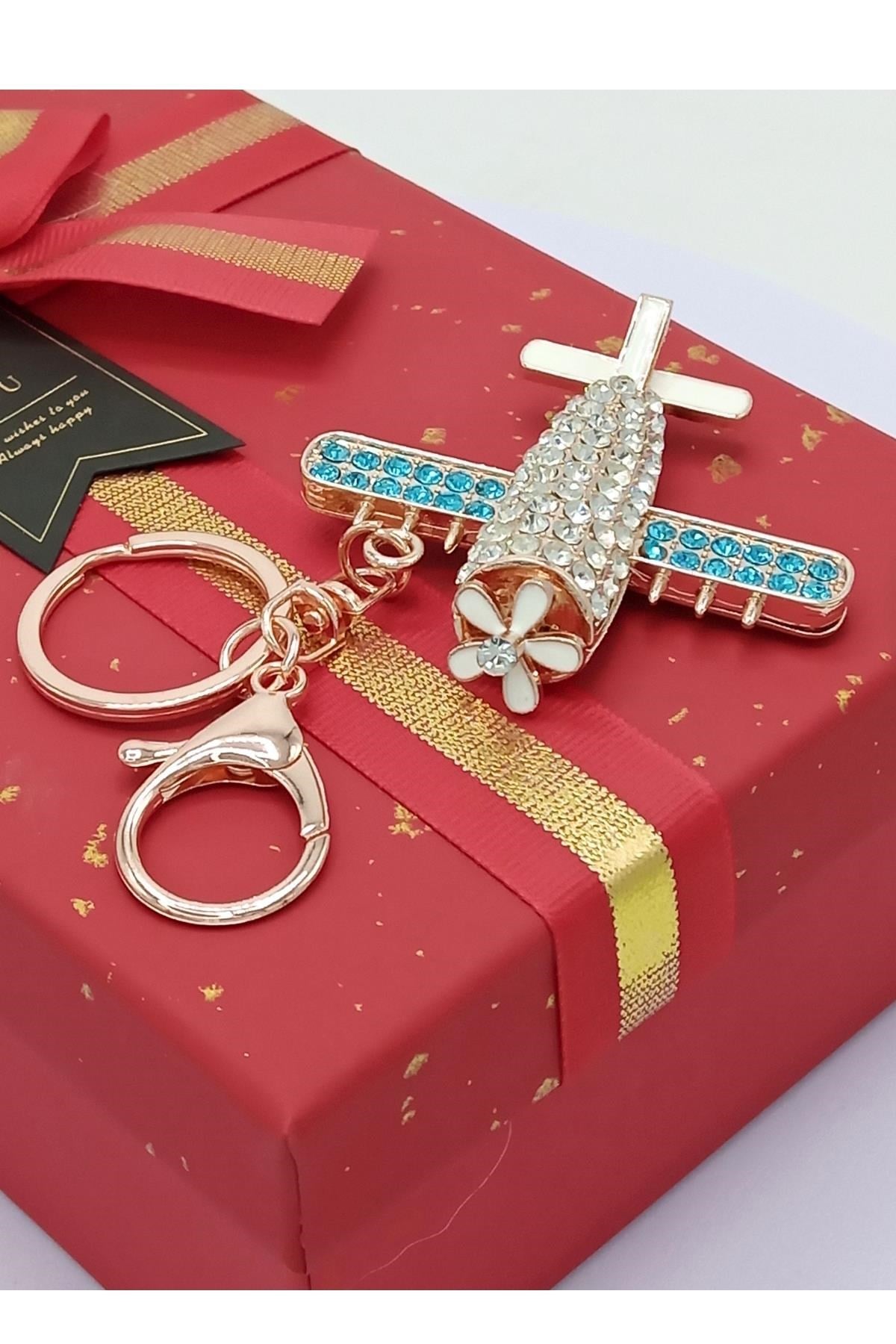 Amerika Birleşik DevletleriDünyadan HediyelerDNY-DHKTANHUCK01Keskin Hediyelik Eşya Ve TekstilKristal Taşlı Mavi Kanatlı Uçak Anahtarlık No.1