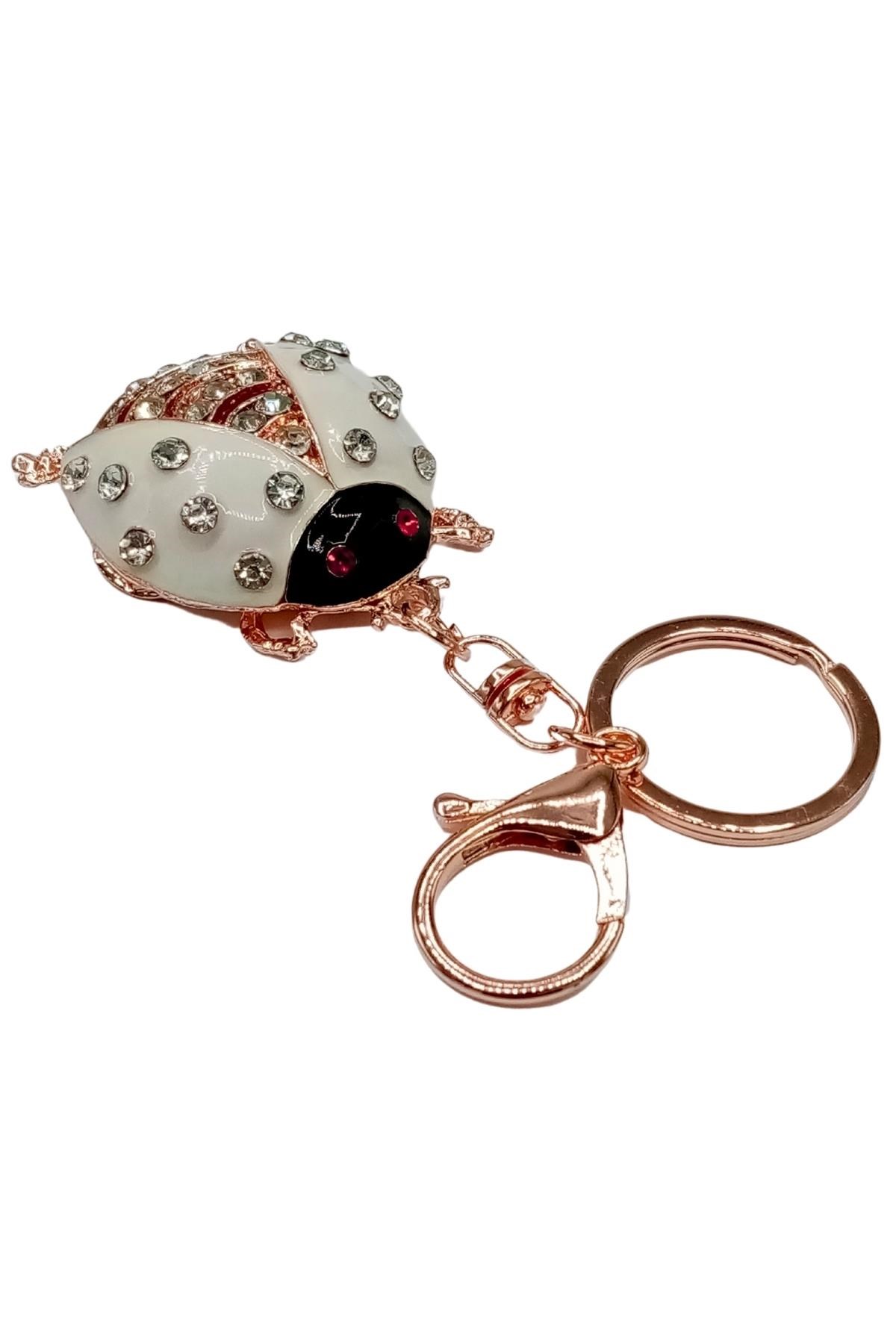 İngiltereDünyadan HediyelerDNY-HDYZMRTUB01Keskin Hediyelik Eşya Ve TekstilKristal Taşlı Uğur Böceği Anahtarlık Beyaz No.1