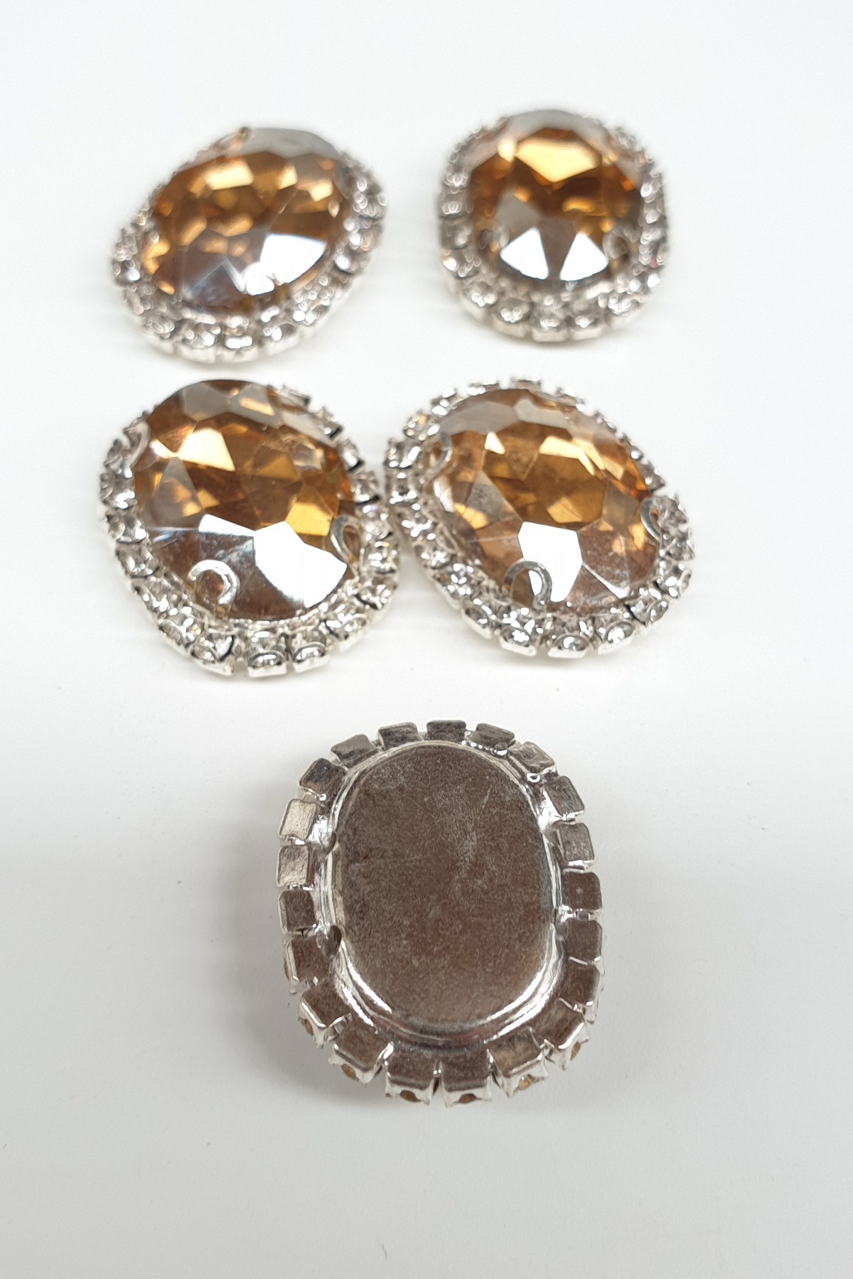 Honey Color Oval Cased Studded Stone