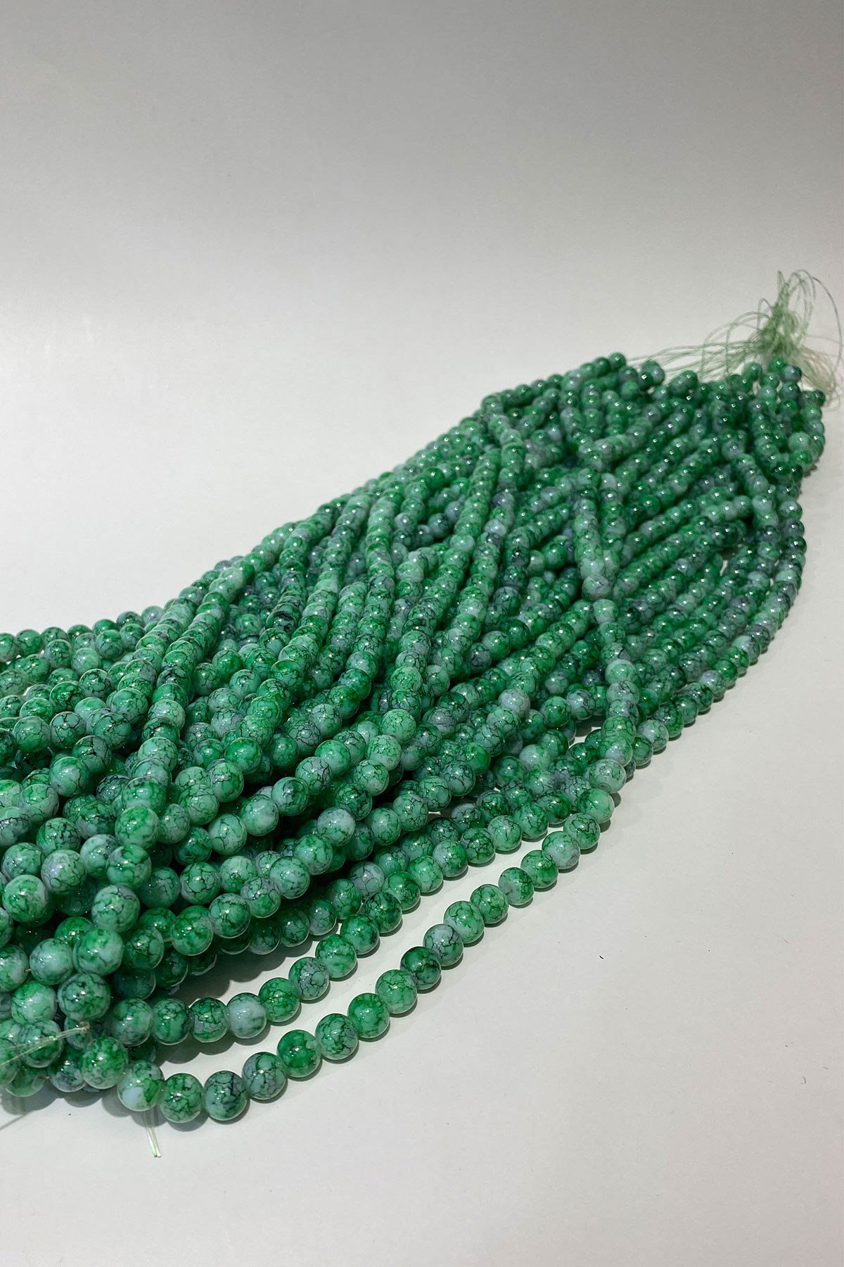 خرز زجاجي من سلسلة منقوشة 8 مم