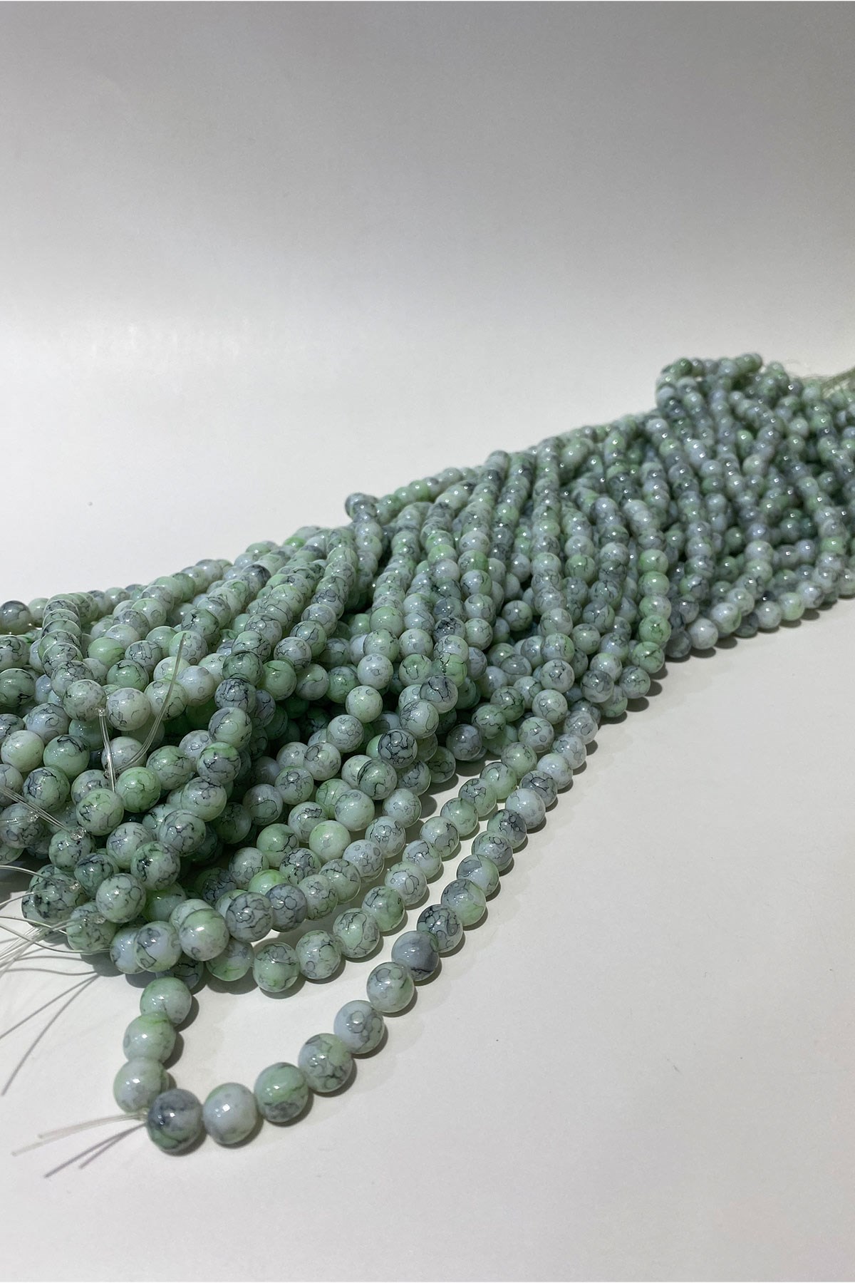 خرز زجاجي من سلسلة منقوشة 8 مم