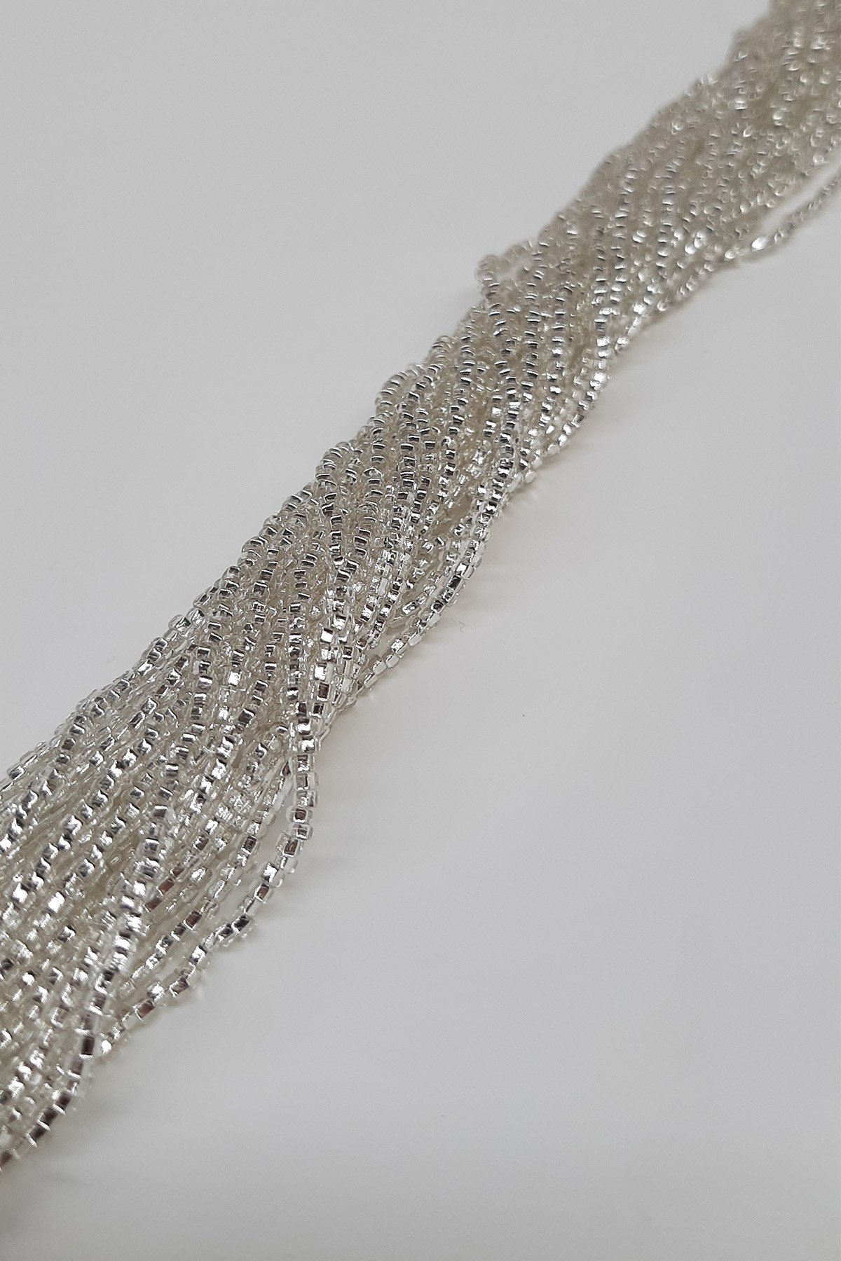 Cut Silver String Sand Beads
