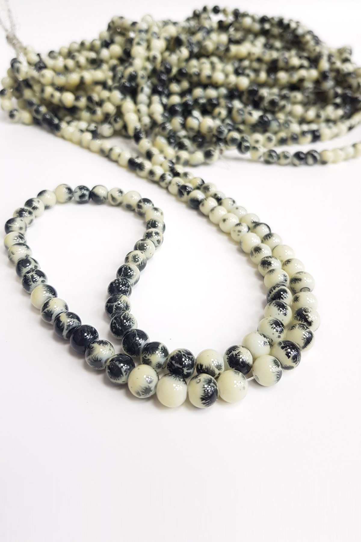 Cream Black Patterned String Glass Beads