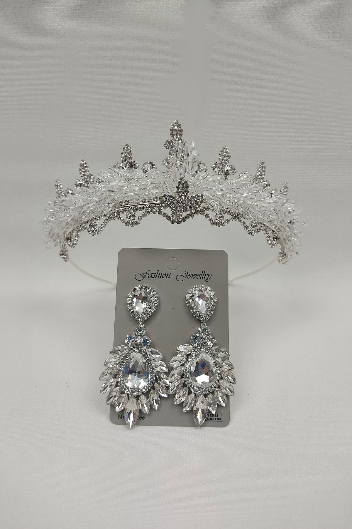 Shuttle Beaded Almond Bridal Crown And Drop Studded Earrings