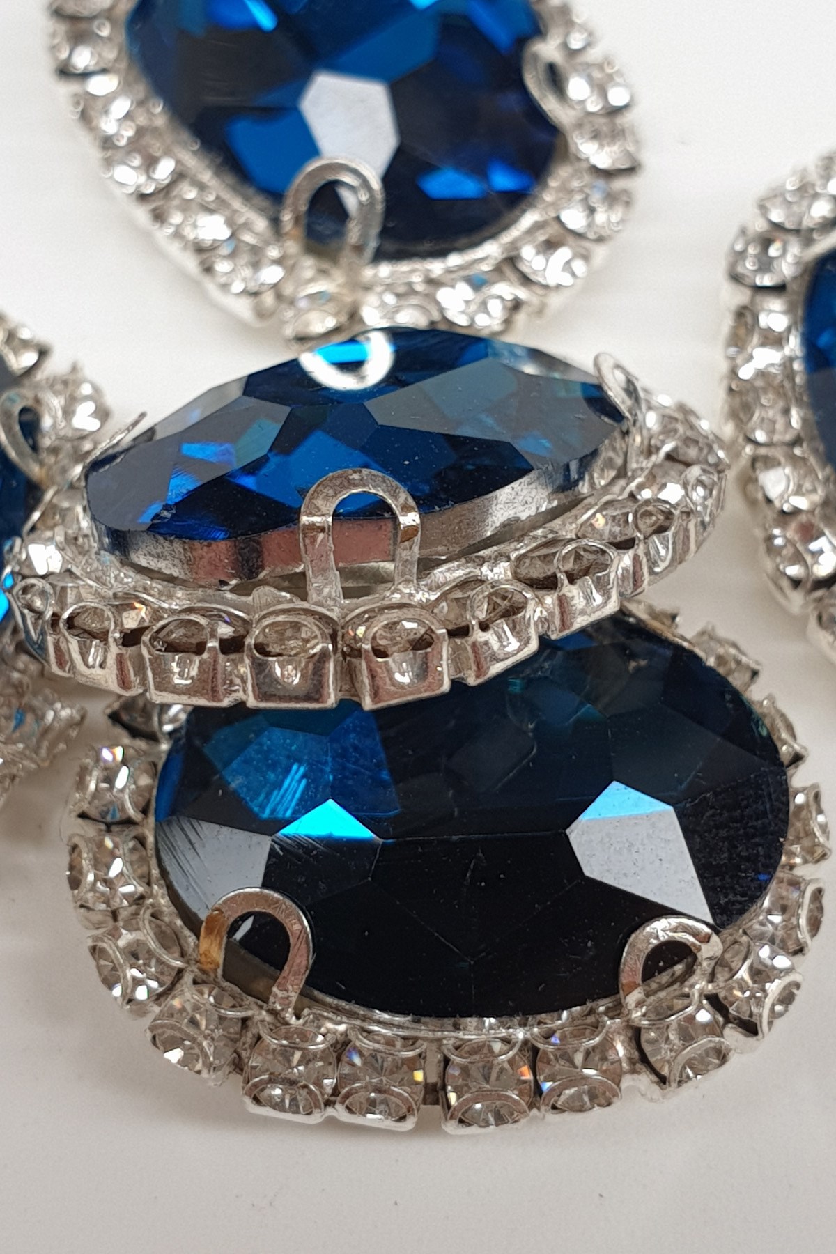 Petrol Blue Oval Cased Studded Stone
