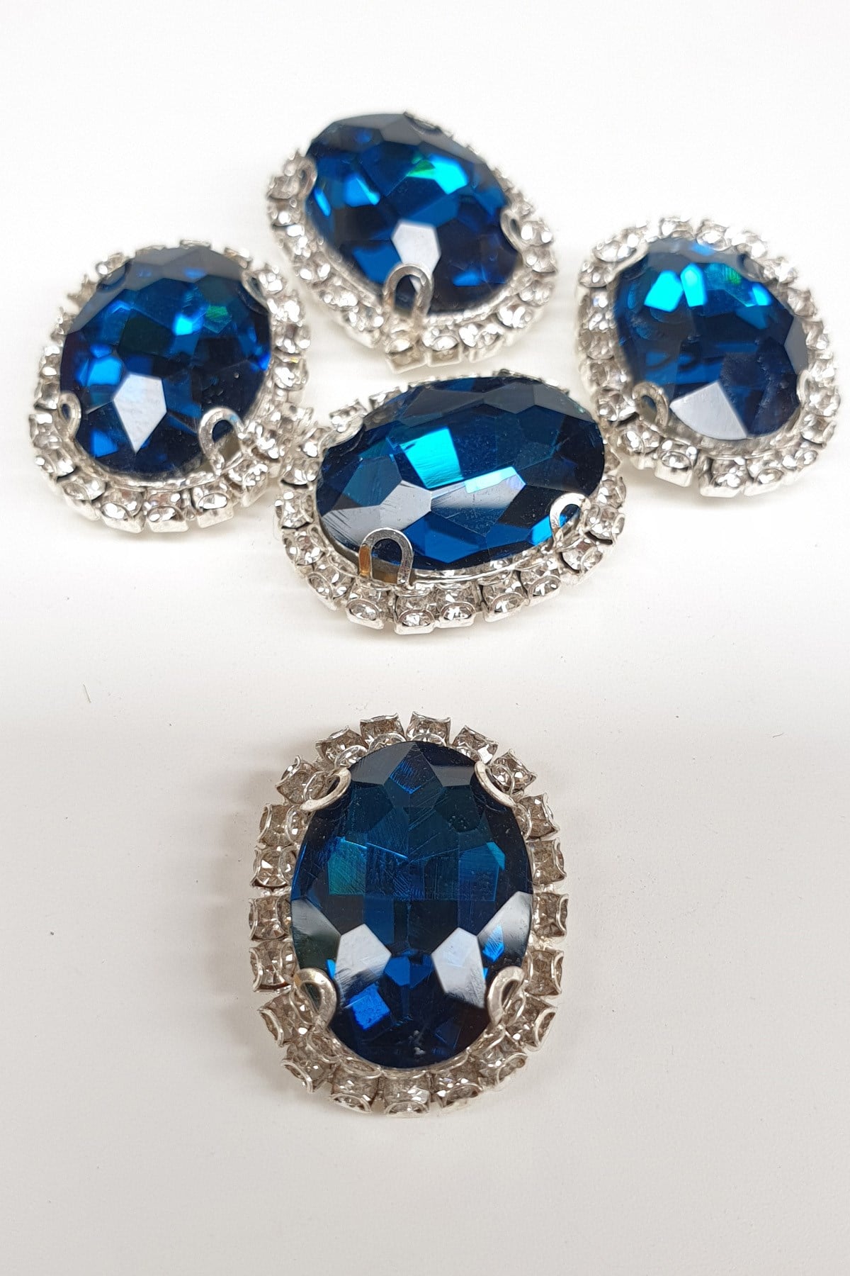 Petrol Blue Oval Cased Studded Stone
