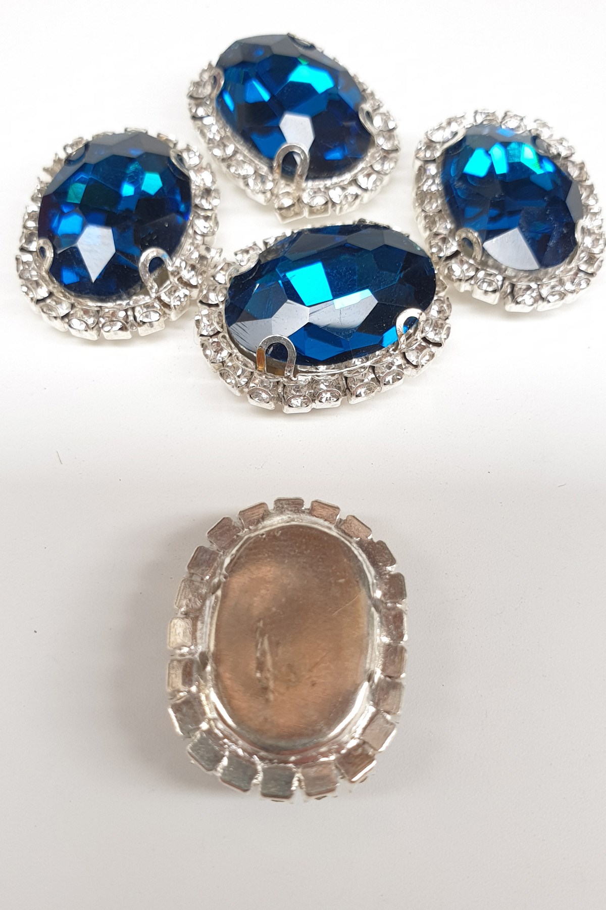 Petrol Blue Oval Cased Studded Stone
