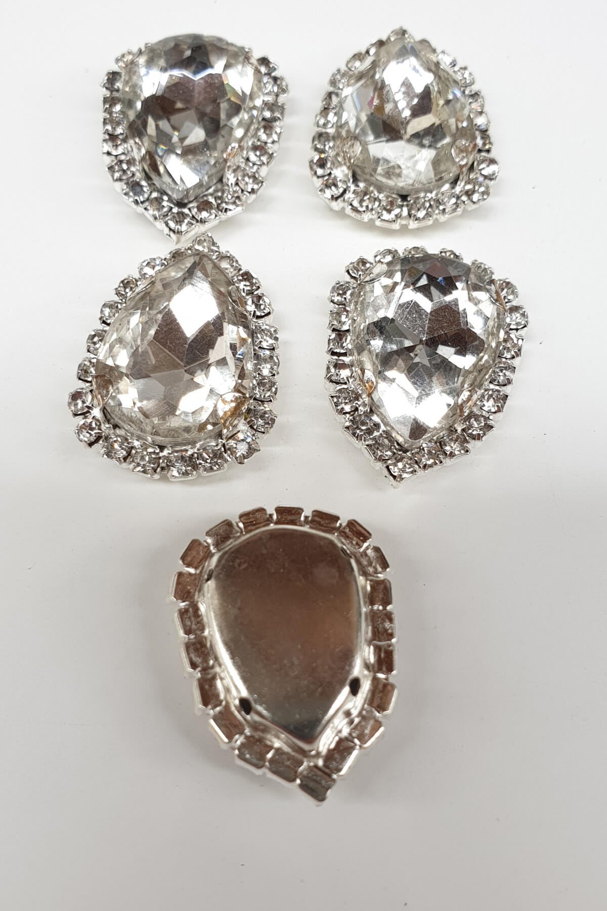 Transparent White Drop Cased Studded Stone