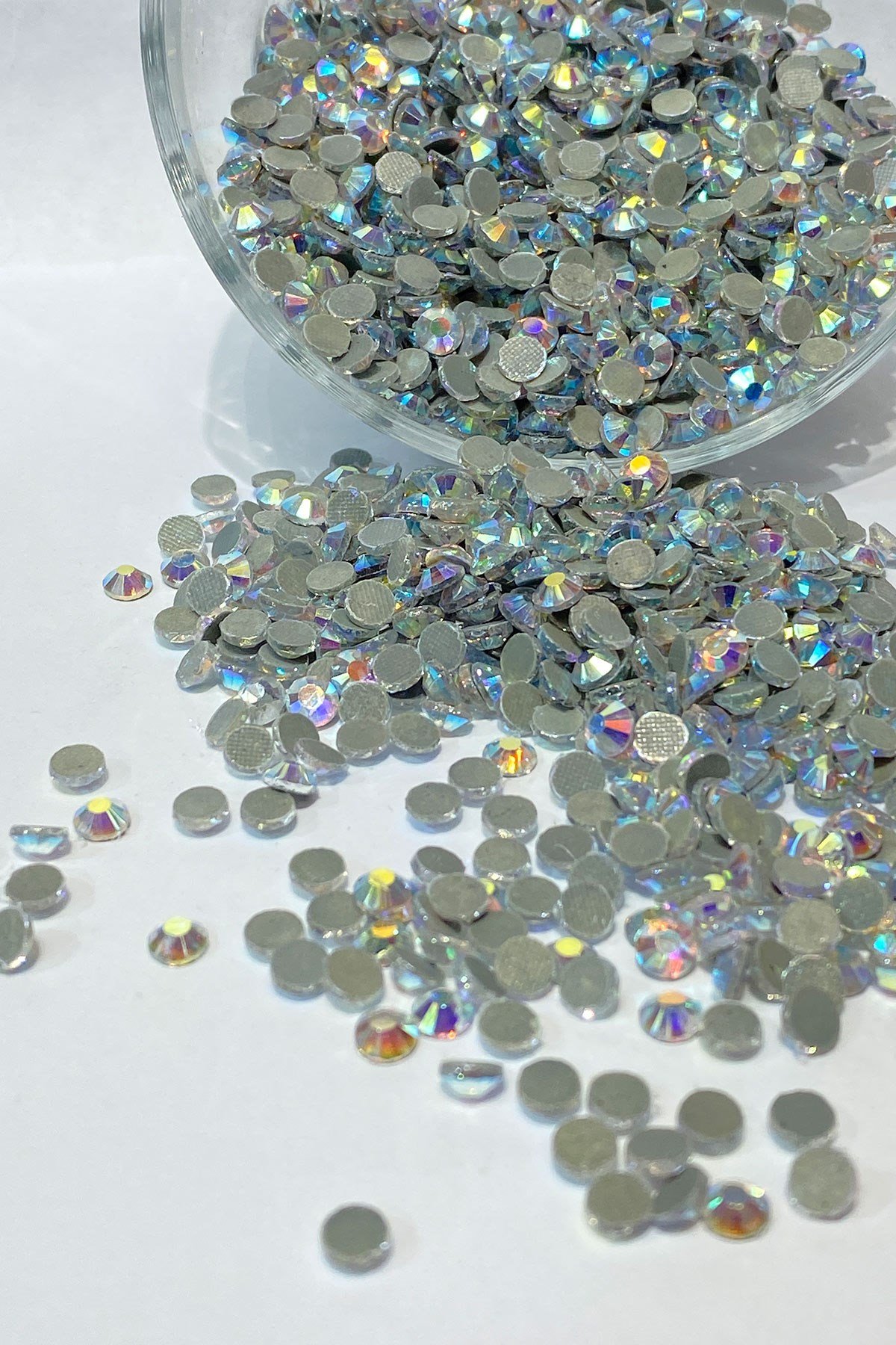 Iron-on Ss20 (5mm) Adhesive Stone with Janjan 25 grm