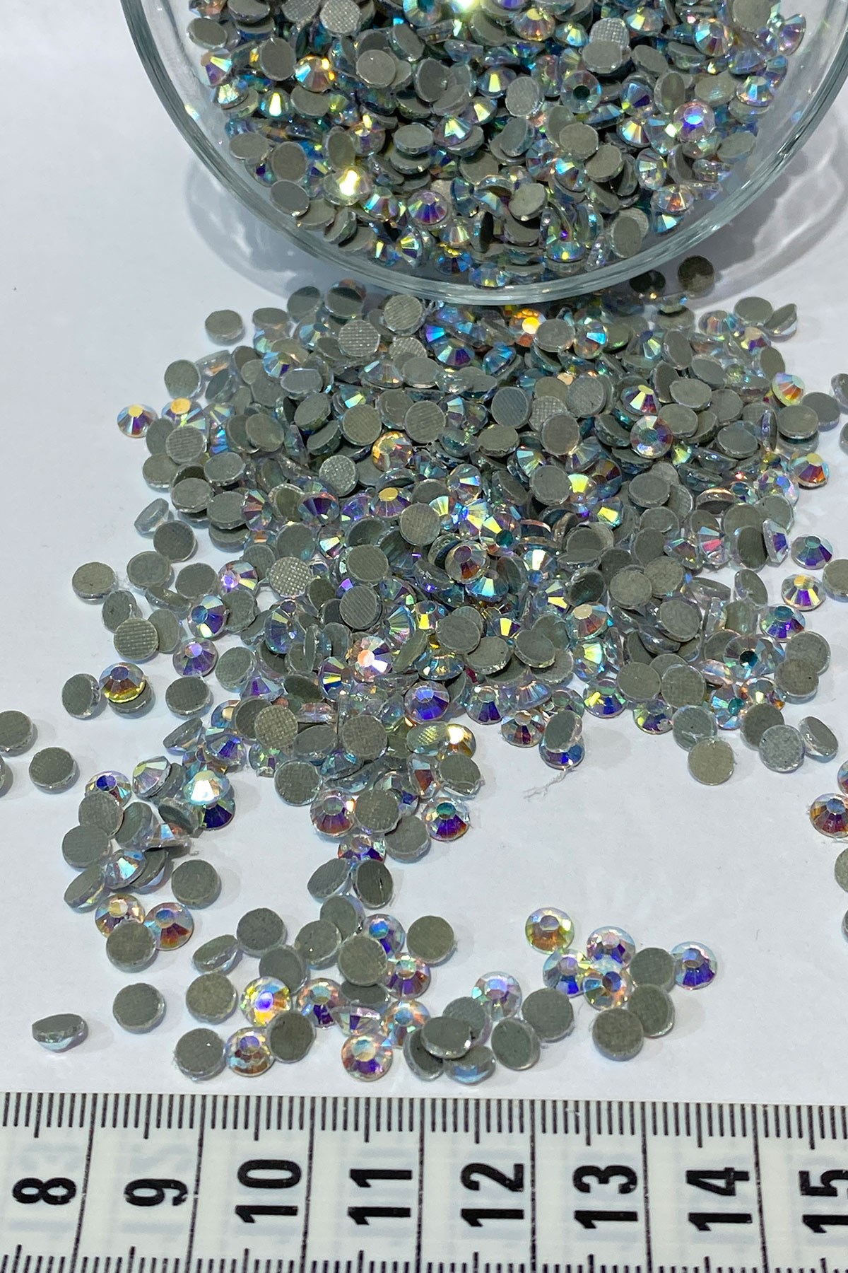 Iron-on Ss20 (5mm) Adhesive Stone with Janjan 25 grm