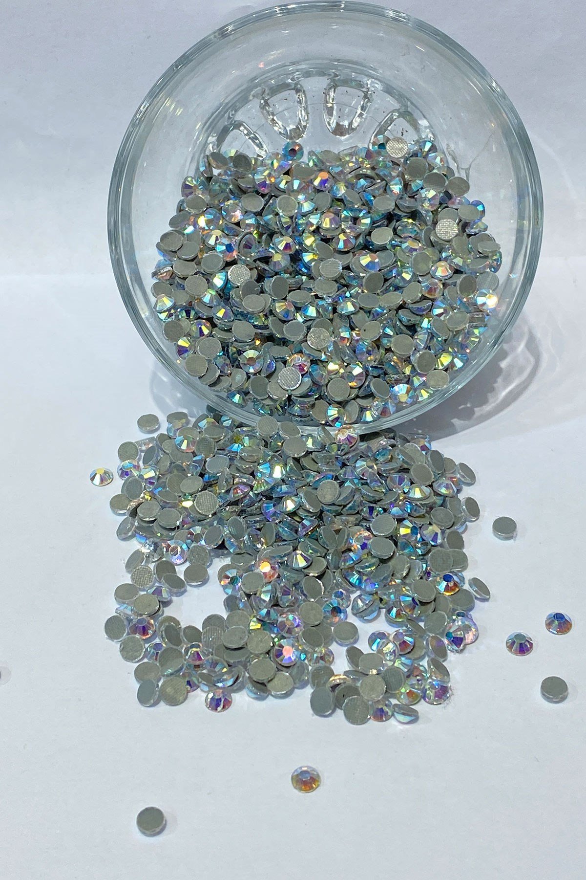 Iron-on Ss20 (5mm) Adhesive Stone with Janjan 25 grm