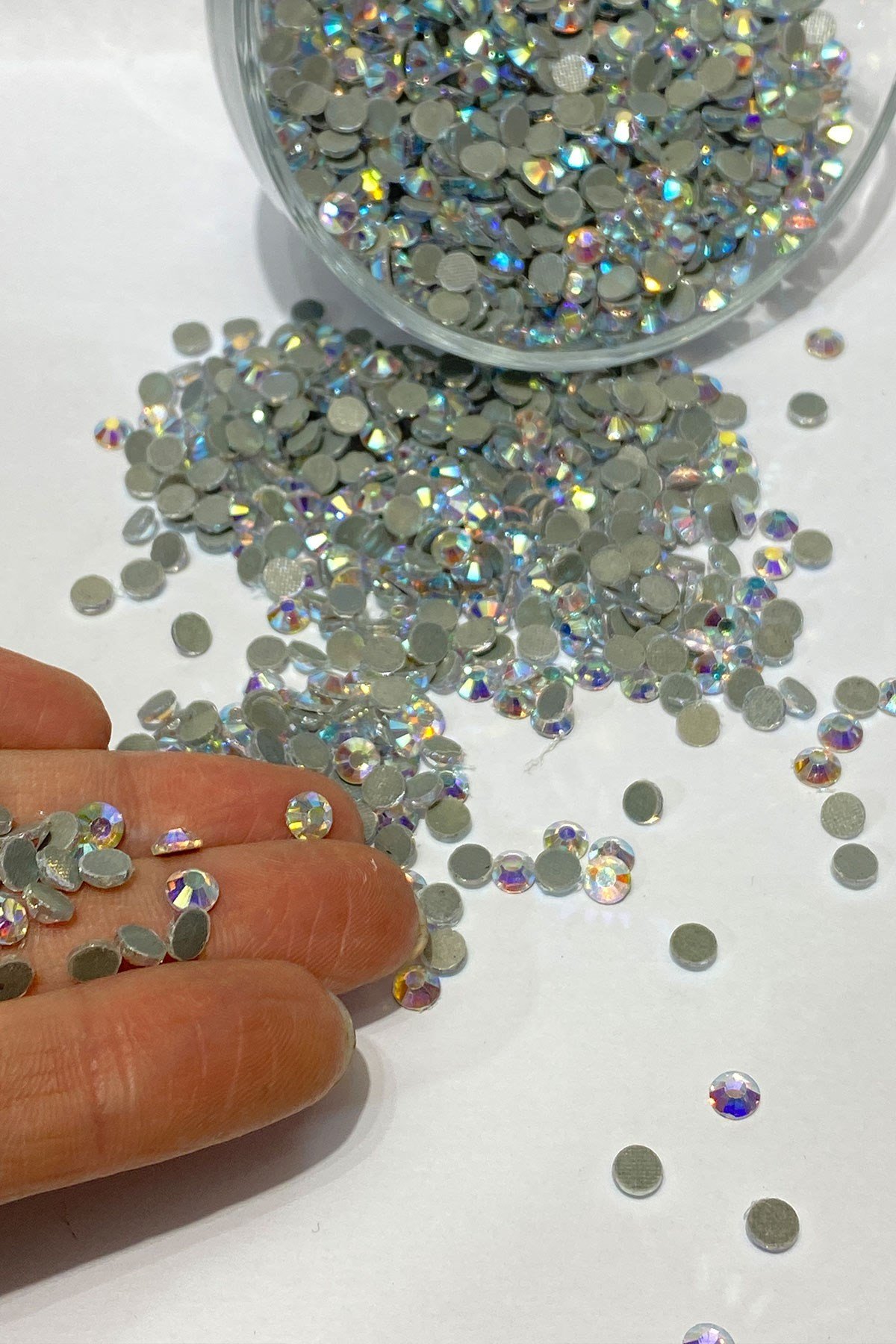 Iron-on Ss20 (5mm) Adhesive Stone with Janjan 25 grm