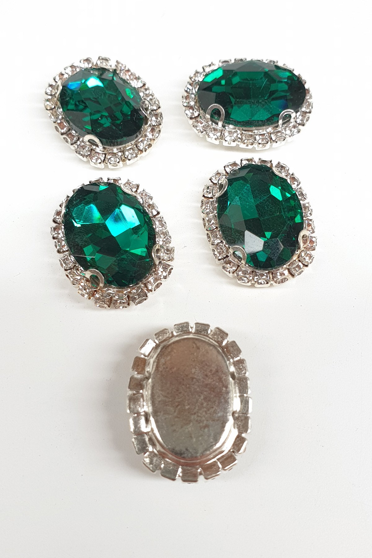 Green Oval Cased Studded Stone