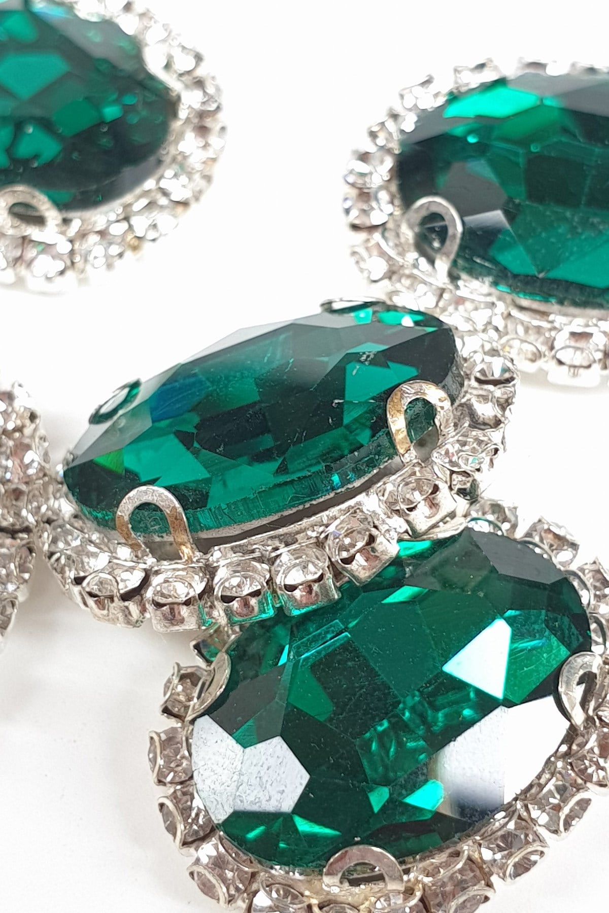 Green Oval Cased Studded Stone
