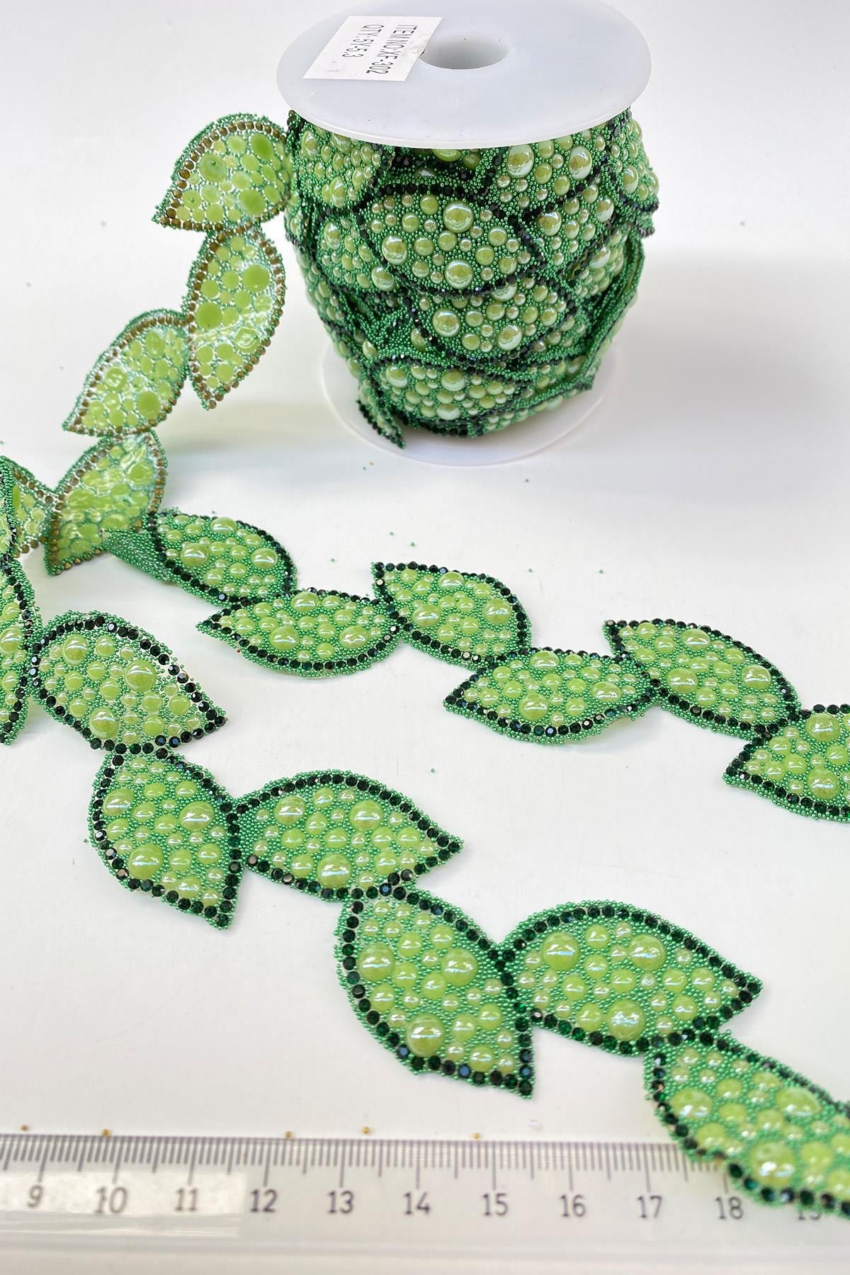 Iron-on Stone Strip Sconce with Green Leaf Motif