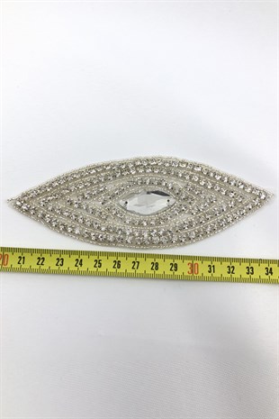 بقلاوة مزينة بالكي على الحجر