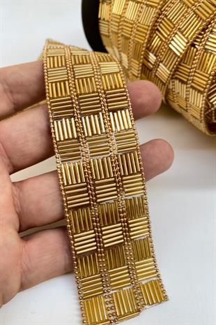 شريط ذهبي واسع من الحديد على الأنابيب مطرز بالشمعدان الحجري