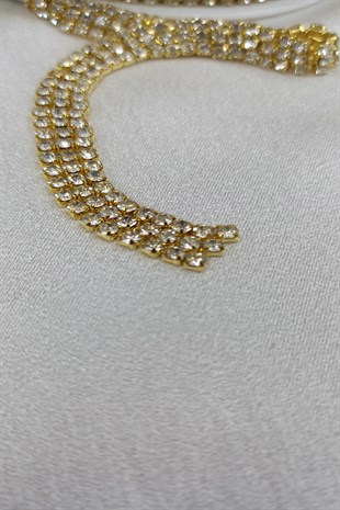 حبات حجر الشريط المتسلسل باللون الذهبي