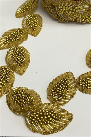 ذهبي اللون ورقة نقش حديد على شريط زين