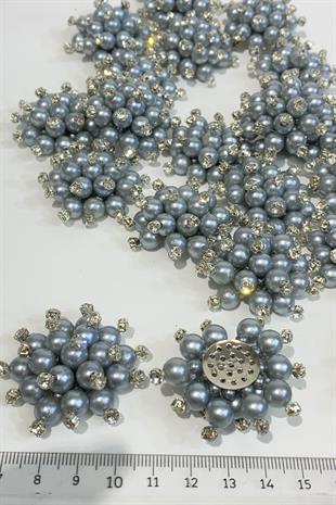 بروش اللؤلؤة والحجر الرمادي