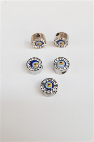 حجر اسطوانة فضية اللون حبة عين الشر