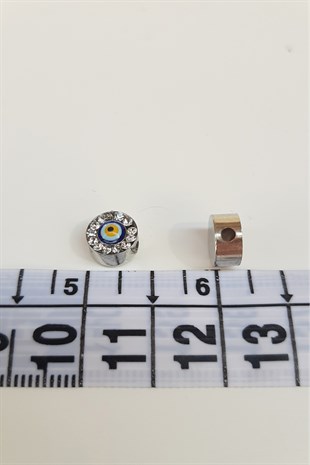 حجر اسطوانة فضية اللون حبة عين الشر