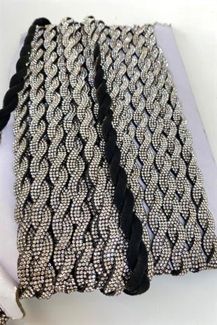 حدود شريطية محبوكة حجرية مع خلفية مخملية