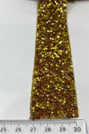 الشريط الحجري البني والذهبي