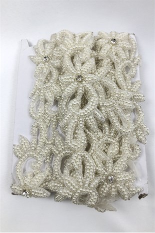 حجر كريم مطرز باللؤلؤ