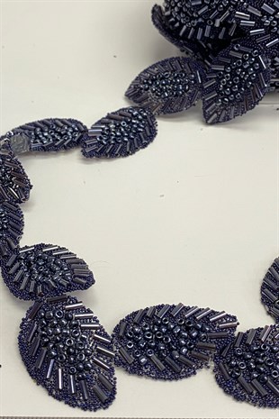 زين حجر على شكل ورقة زرقاء داكنة