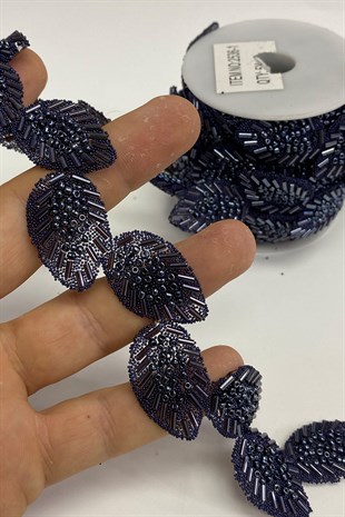 زين حجر على شكل ورقة زرقاء داكنة