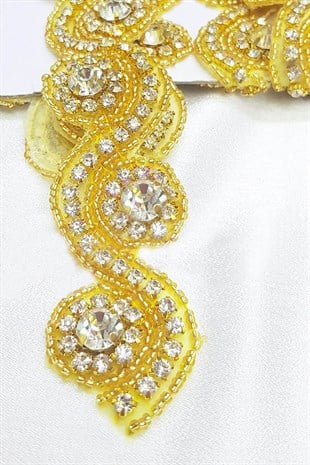 حجر الكريستال الأصفر على الشريط