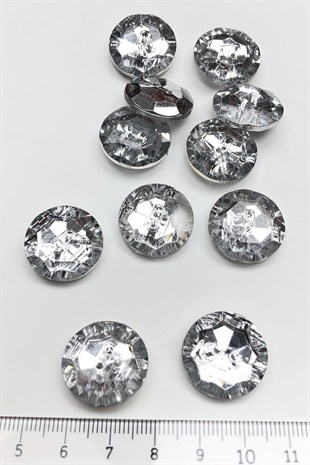 زر بلاستيكي بفتحة مركزية شفافة