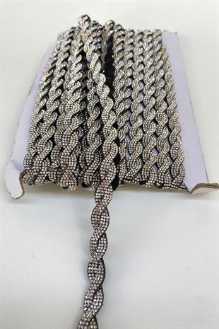 حدود شريطية مضفرة حجريًا مع خلفية مخملية سوداء