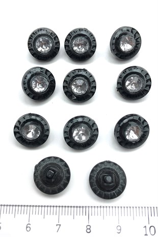 زر الحجر البلاستيكي الأسود