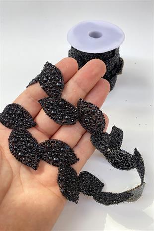 الشمعدان الشريطي المصنوع من الحديد على شكل ورقة سوداء