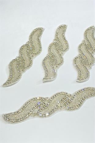 الشمعدان الحجري المطرز بخرز الممر المائي