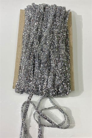 حجر مزين بحجر الزخرفة باللون الفضي