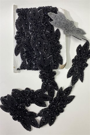 شريط مزين بحجر نقش الأزهار باللون الأسود