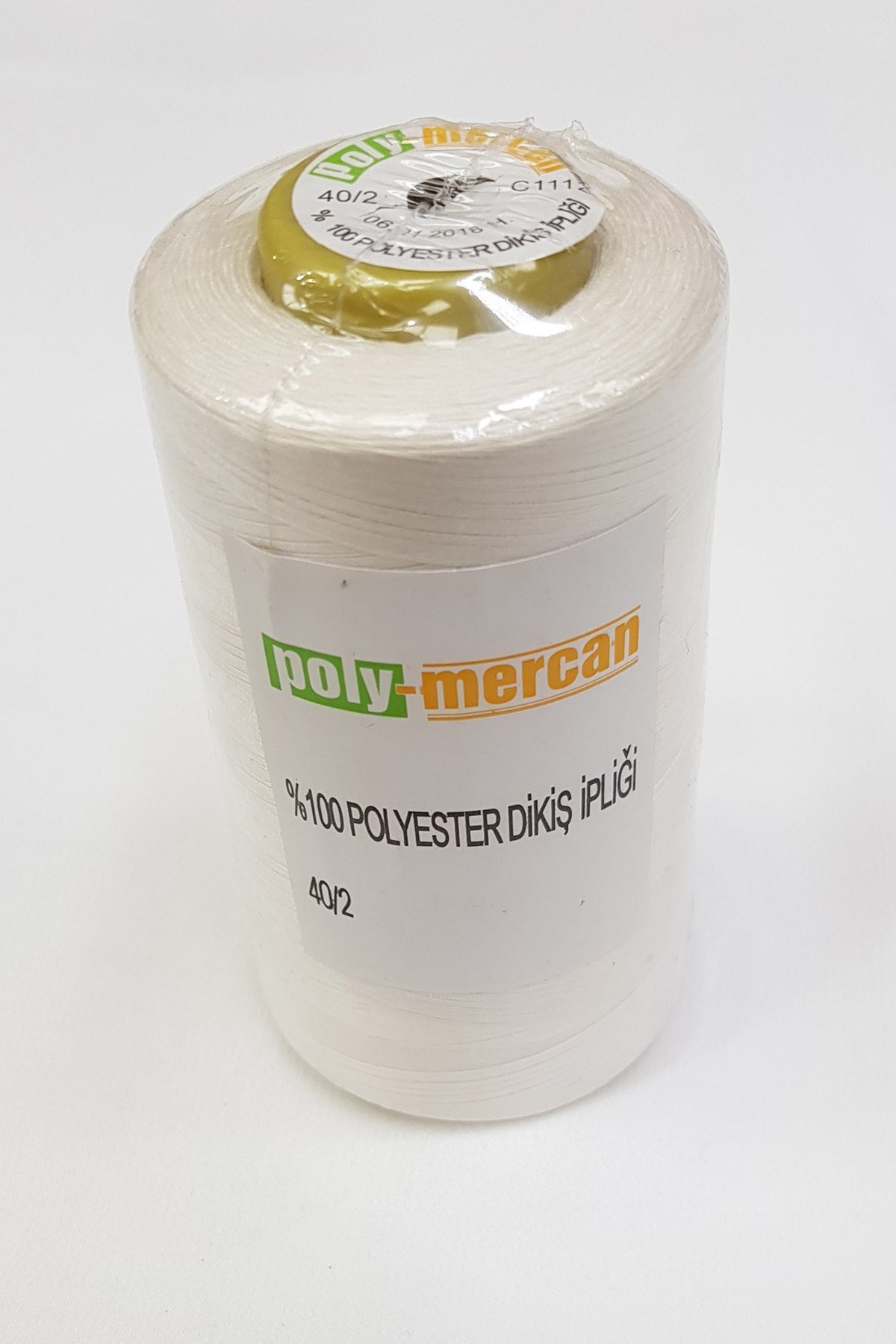 بكرة خيط خياطة من البوليستر الكريمي