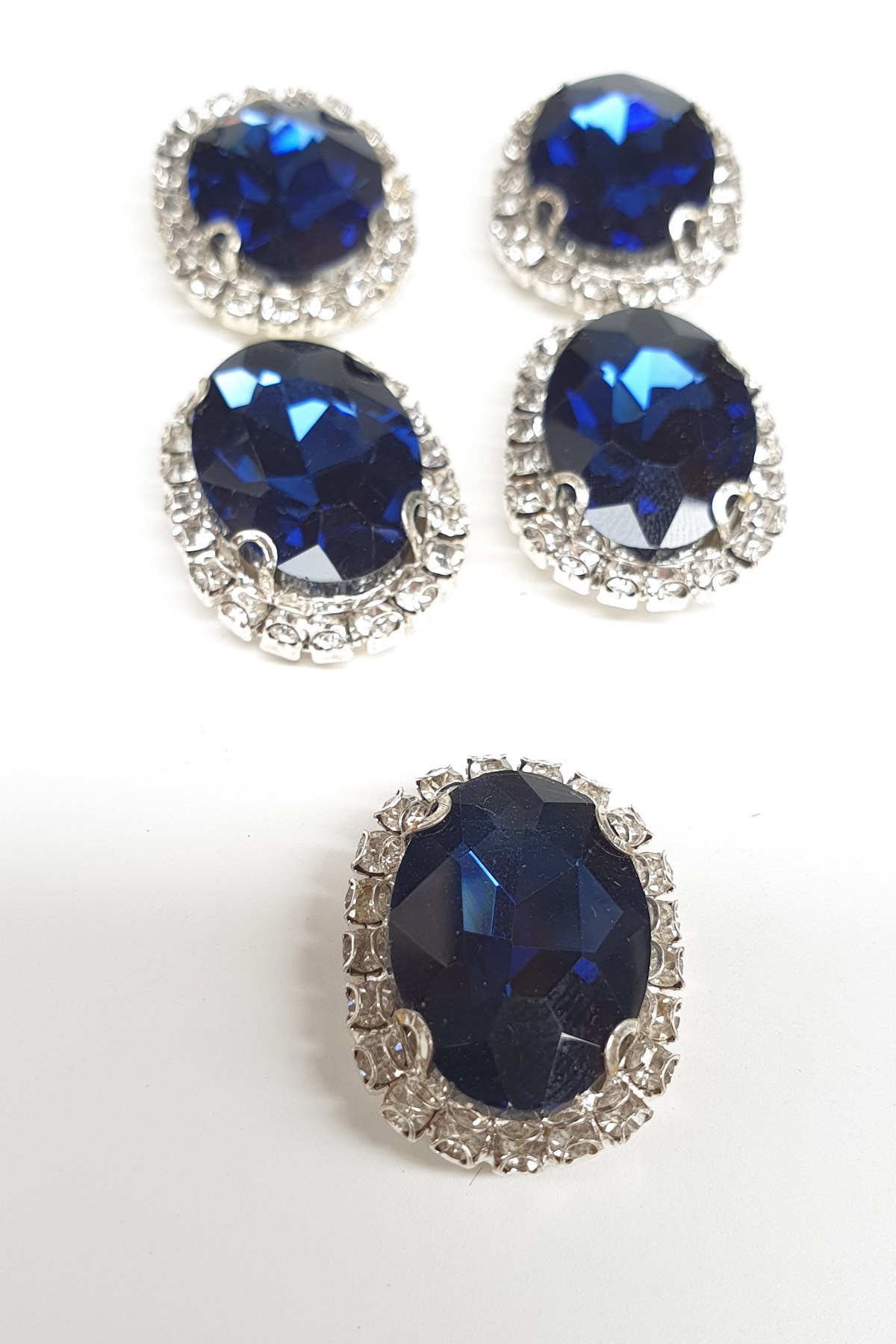 Dark Blue Oval Cased Studded Stone
