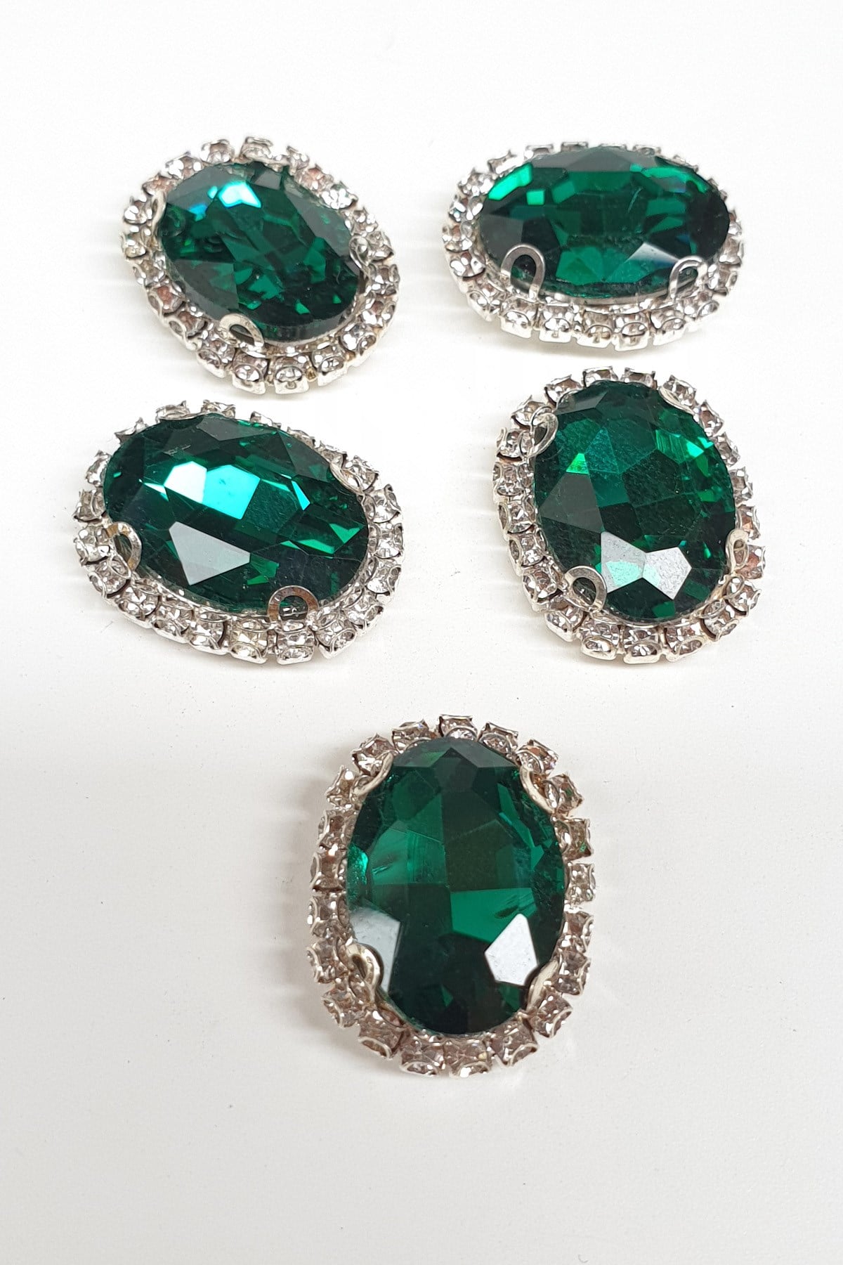 Green Oval Cased Studded Stone