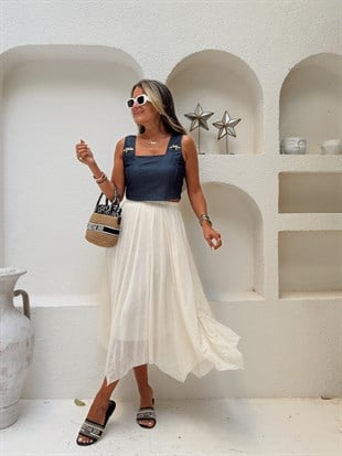 Nişantaşı Butik ASİMETRİK KESİM DESENLİ VANİLYA ETEK